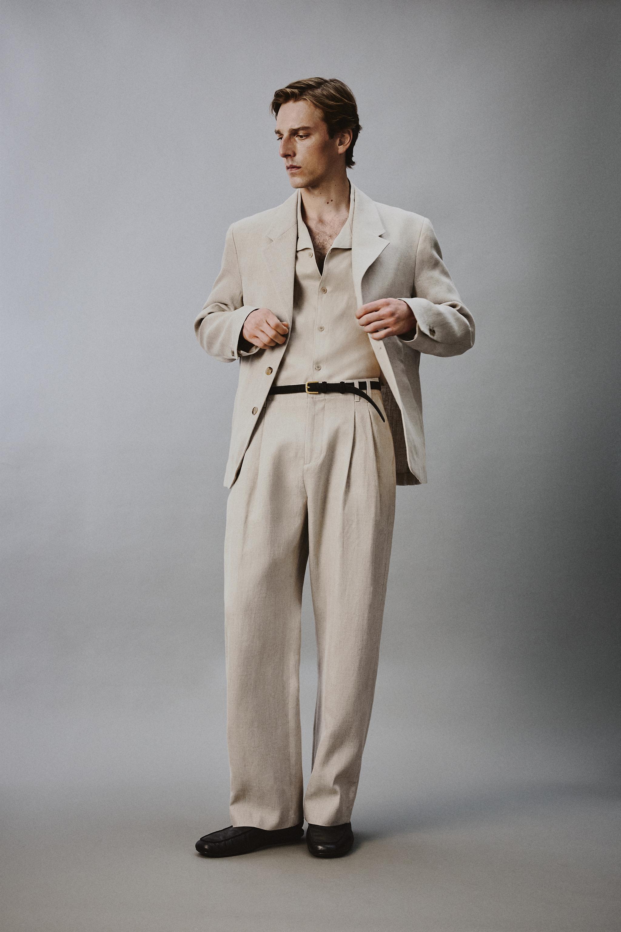 PANTALON À PLIS EN COTON ET LIN